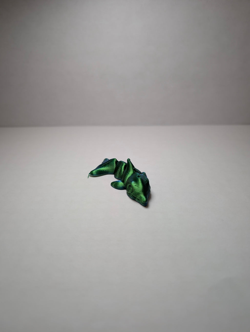 The Emerald Flexi-Dolphin – Your Desk’s New Splash of Color