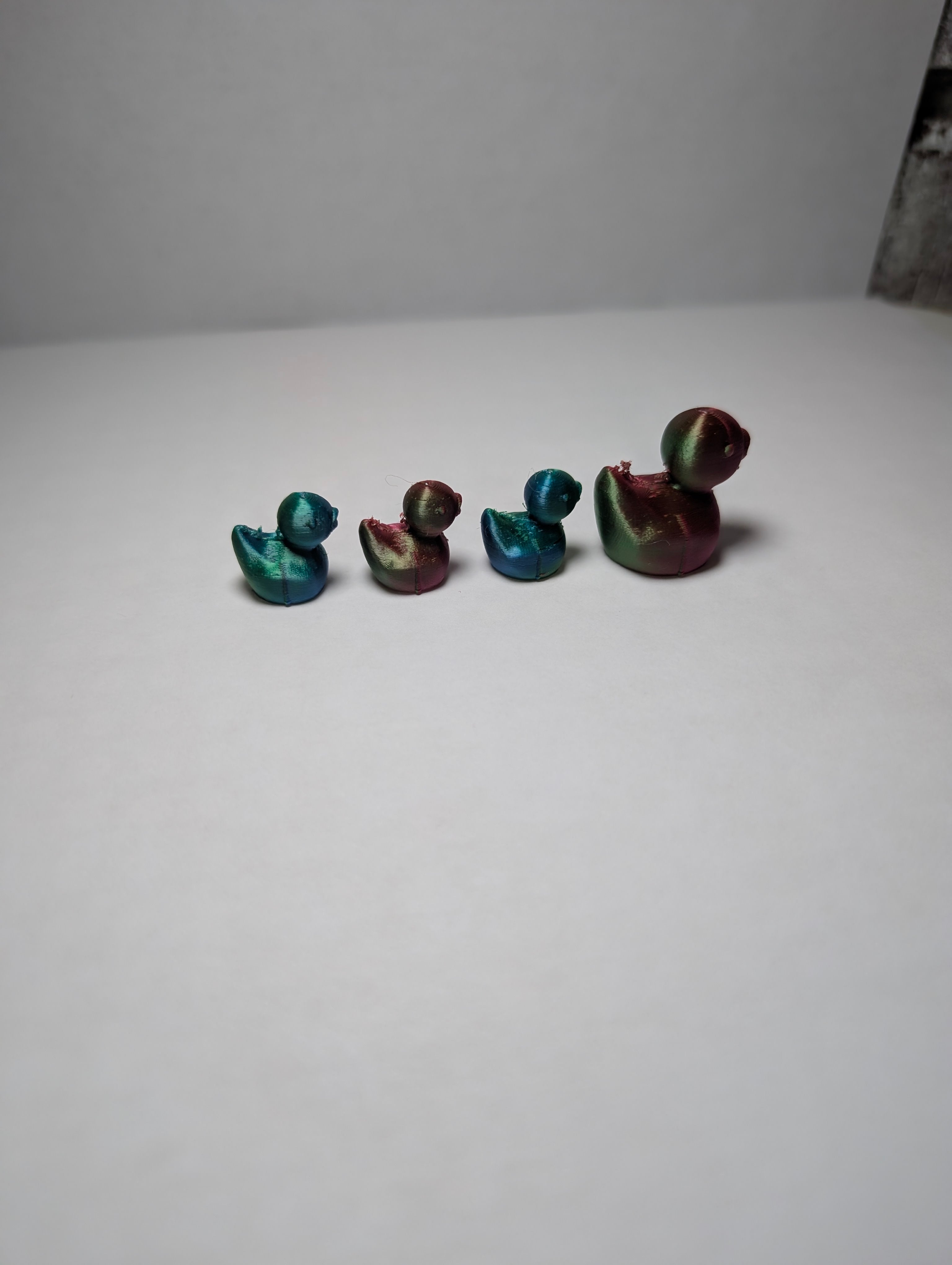 The Shimmering Duck Squad – A Tiny, Iridescent Family