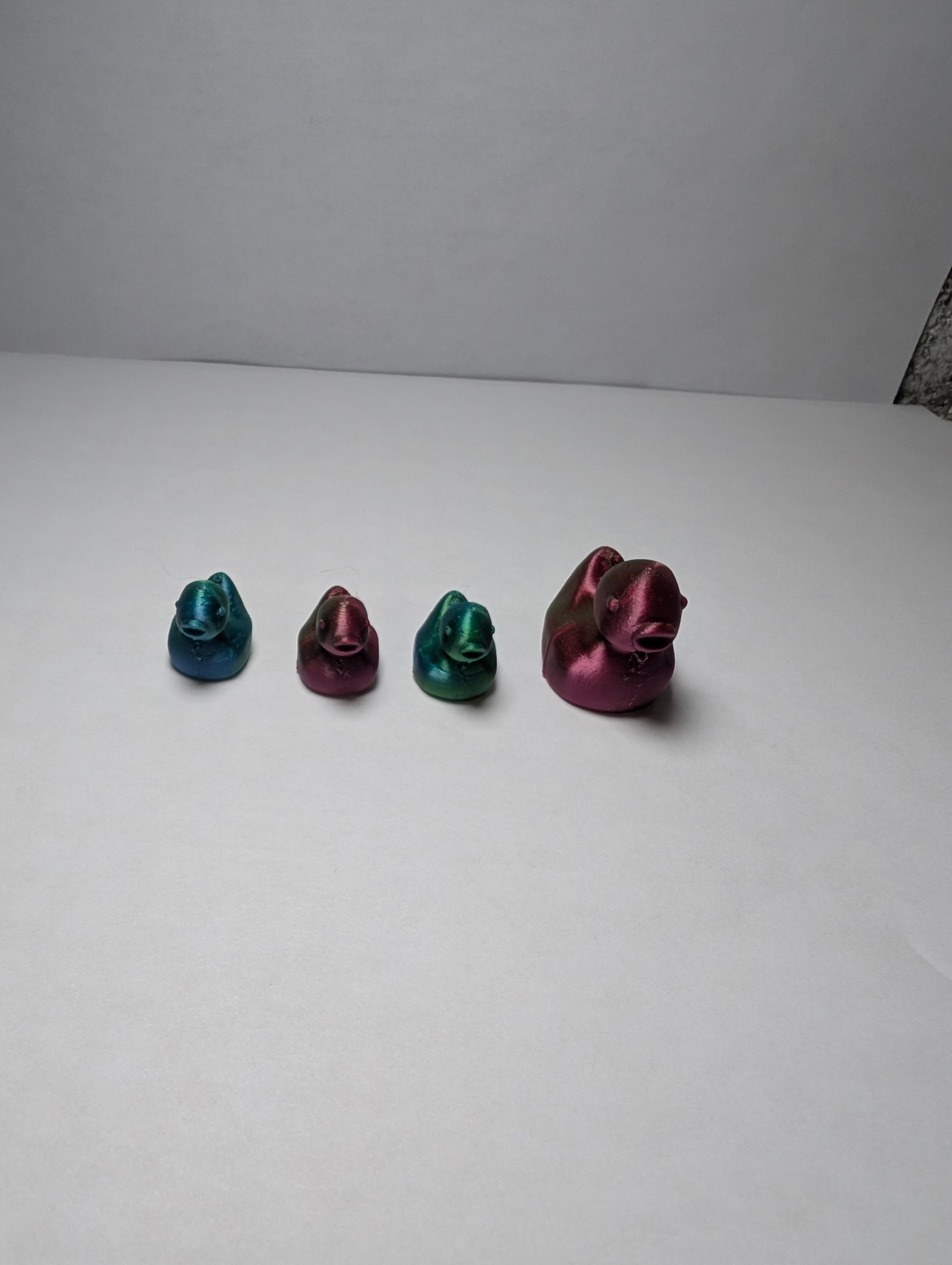 The Shimmering Duck Squad – A Tiny, Iridescent Family