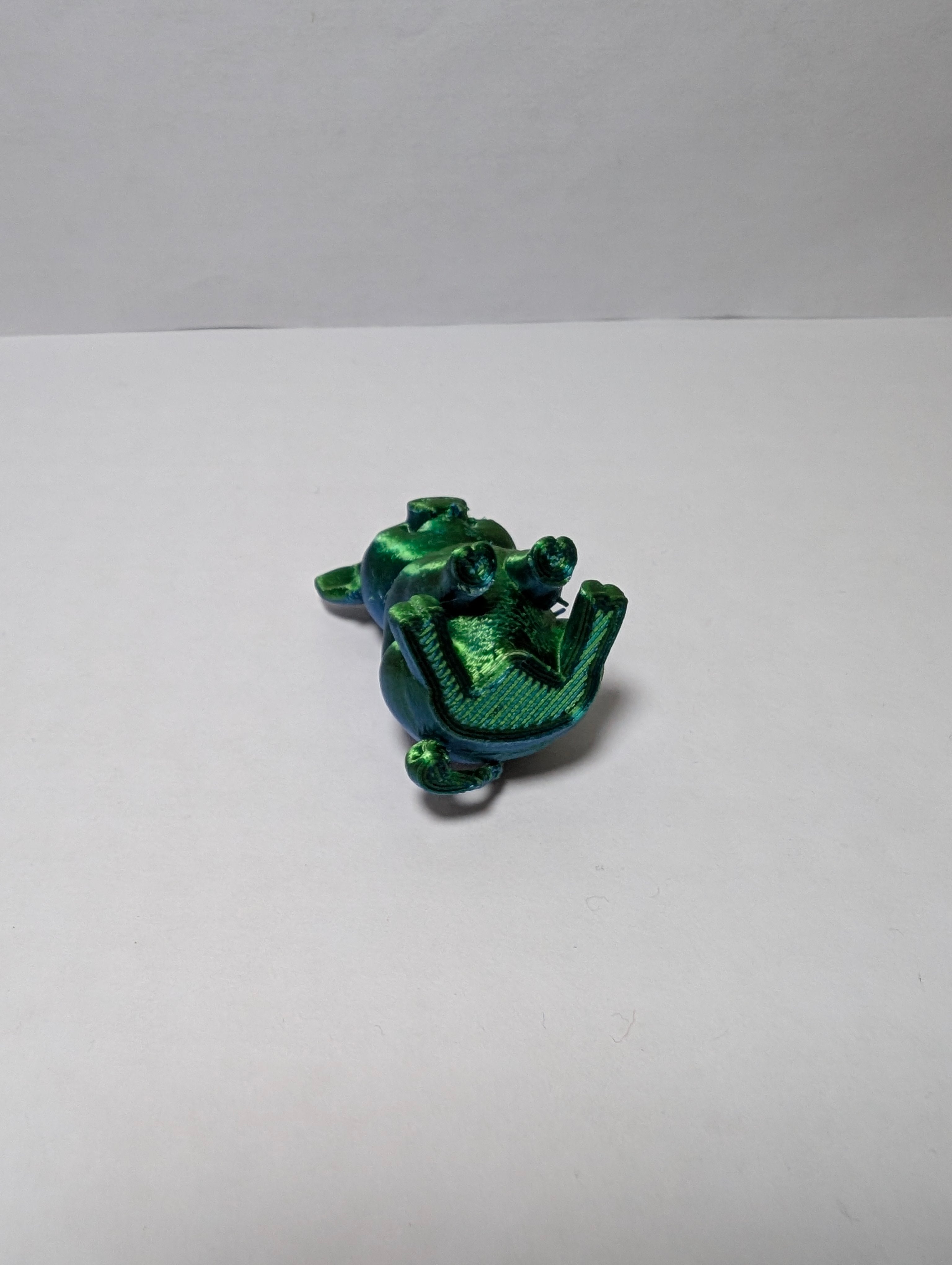 The Emerald Sitting Piglet – A Shiny Spot of Good Luck